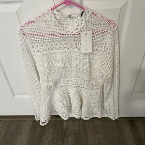 Beautiful white shirt new with tags. In a pet free smoke free home